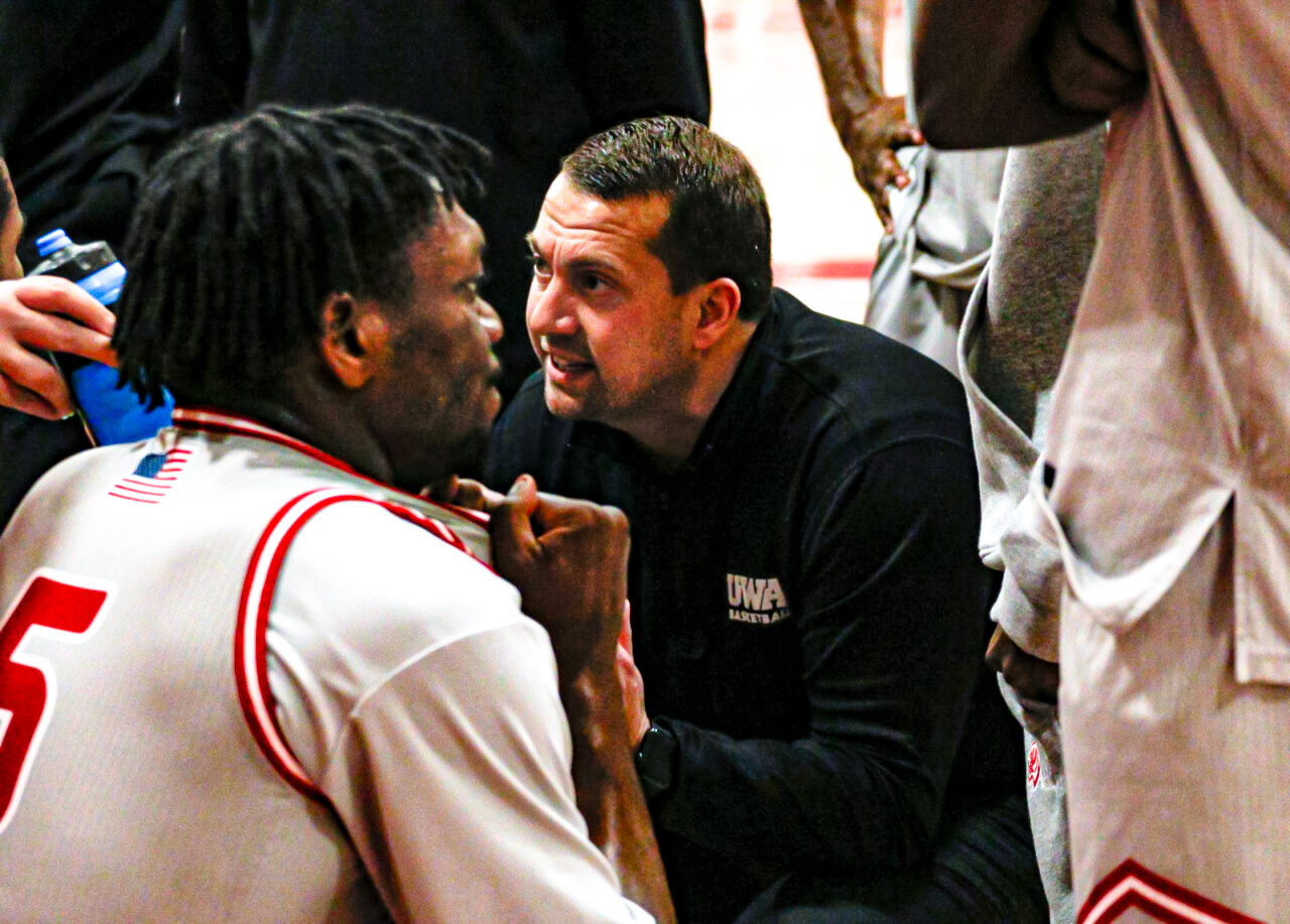 Coach in huddle